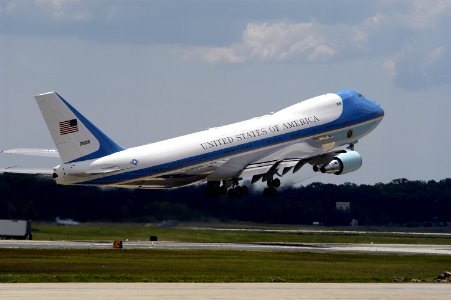 US Navy 050521-N-0295M-026 Air Force One takes off from Andrews Air Force Base, Md., during the 2005 Joint Service Open House photo