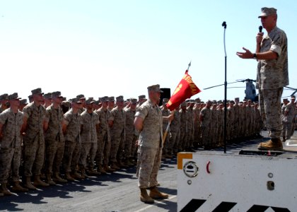 US Navy 050617-N-5313A-030 Commandant of the Marine Corps, Gen. Michael Hagee, addresses Marines and Sailors on the flight deck aboard the amphibious assault ship USS Kearsarge (LHD 3)