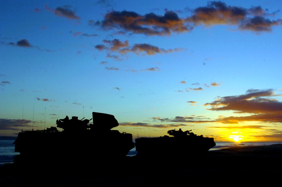 US Navy 050628-N-9866B-075 Amphibious Assault Vehicles (AAVs), assigned to the 3rd Amphibious Assault Battalion, line the beach