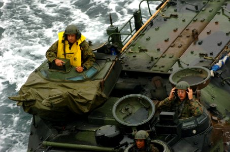 US Navy 050615-N-9866B-007 An amphibious assault vehicle makes its way through the Pacific Ocean to embark aboard the amphibious assault ship USS Peleliu (LHA 5) photo