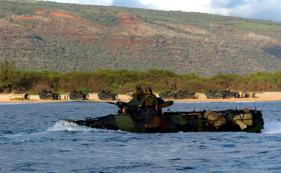 US Navy 050628-N-9866B-057 U.S. Marines assigned to the 3rd Amphibious Assault Battalion, navigate their Amphibious Assault Vehicle (AAV) through the Pacific Ocean