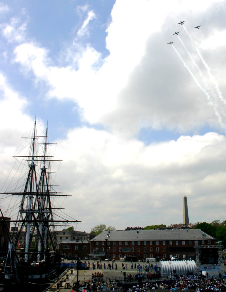 US Navy 050618-N-8110K-112 Four L-17 Navions from the Warbirds of America's Patriot Squadron conduct a formation flyover above the Bunker Hill monument and USS Constitution