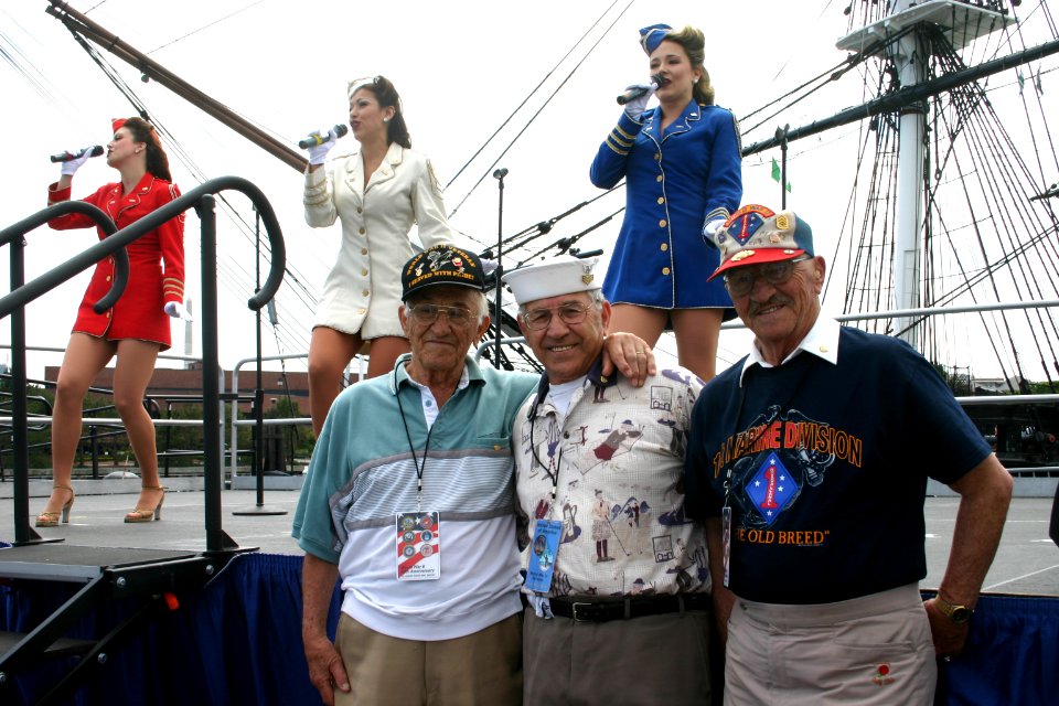 US Navy 050618-N-8110K-136 From left, World War II veterans and brothers, Tommy Mazzareilla (Marine Corps), Phil Mazzareilla (Navy), and Henry Mazzareilla (Army) enjoy the '40s music of the Liberty Belles