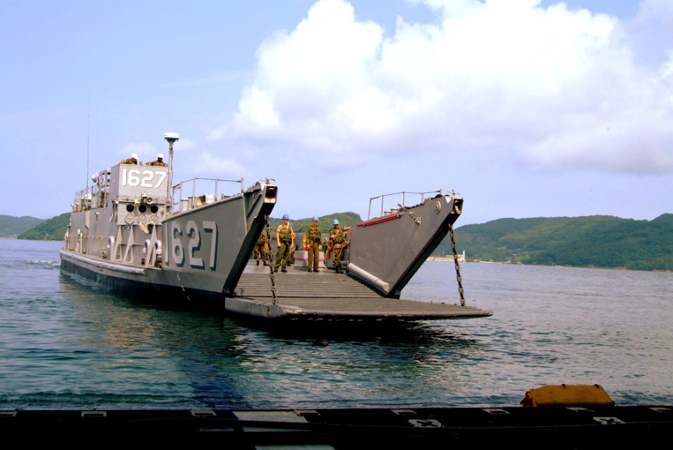 US Navy 050706-N-4772B-015 Landing Craft, Utility (LCU) 1627, assigned to Assault Craft Unit One (ACU-1), prepares to pull into the well deck aboard the amphibious assault ship USS Essex (LHD 2)