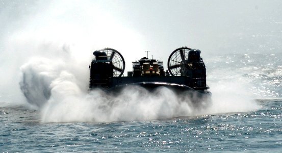 US Navy 050621-N-9866B-010 A Landing Craft, Air Cushion (LCAC), assigned to Assault Craft Unit Five (ACU-5), makes its way through the Pacific Ocean