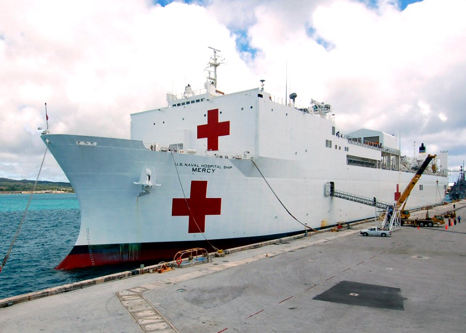US Navy 050615-N-3532C-004 The Military Sealift Command hospital ship USNS Mercy (T-AH 19) makes a one-day stop to give the crew a break and pick up Naval Mobile Construction Battalion Four Zero (NMCB-40)