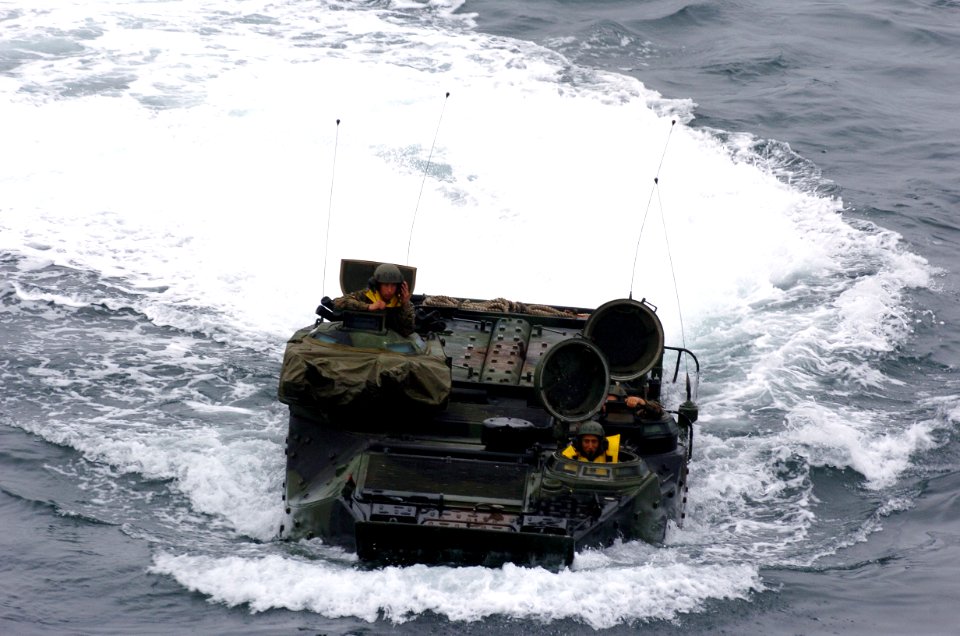 US Navy 050615-N-9866B-024 An amphibious assault vehicle makes its way through the Pacific Ocean to embark aboard the amphibious assault ship USS Peleliu (LHA 5)