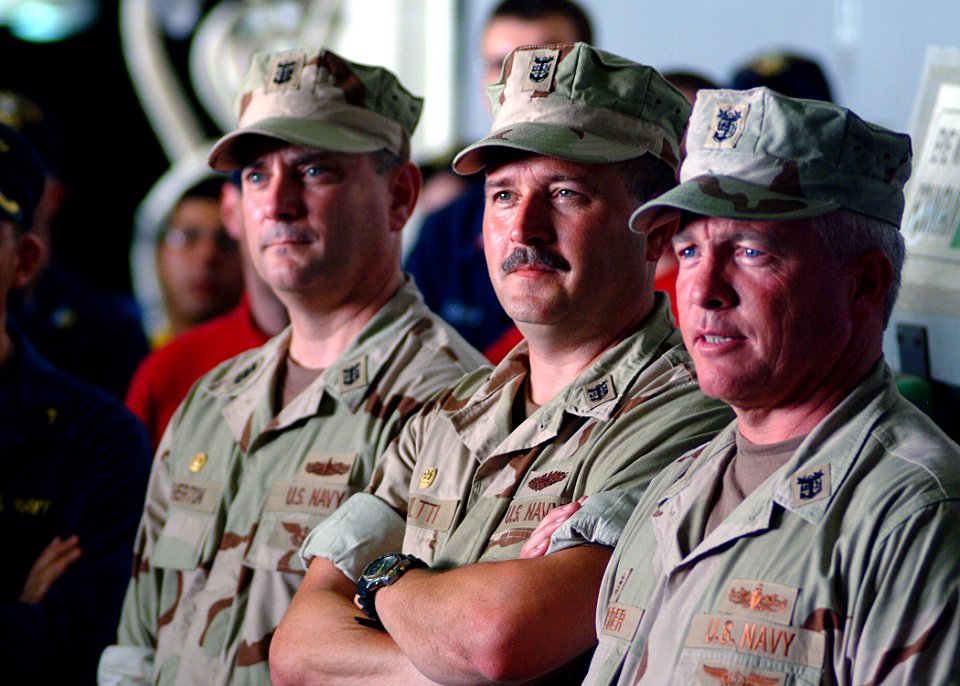 US Navy 050712-N-0962S-136 Three of the Navy's top Command Master Chiefs (CMCs) observe an all hands call by Master Chief Petty Officer of the Navy (MCPON) Terry Scott