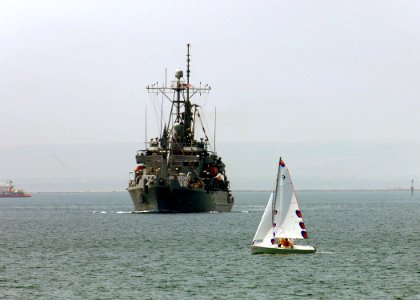 US Navy 050617-N-1464F-001 The salvage ship USS Grasp (ARS 51) pulls into the Taranto Naval Base Mar Grande to participate in the North Atlantic Treaty Organization (NATO) submarine escape and rescue exercise Sorbet Royal 2005