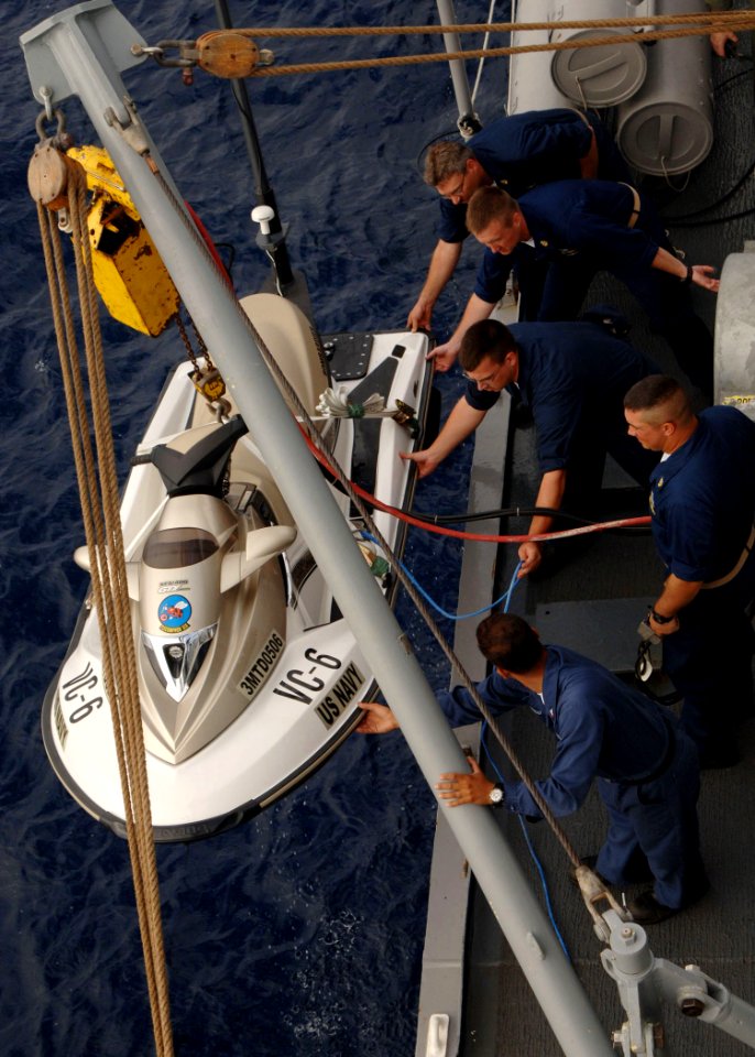US Navy 050712-N-4374S-014 Sailors assigned to Fleet Composite Squadron Six (VC-6), hoist a Ship Deployable Surface Target (SDST) aboard the guided missile frigate USS Samuel B. Roberts (FFG 58)