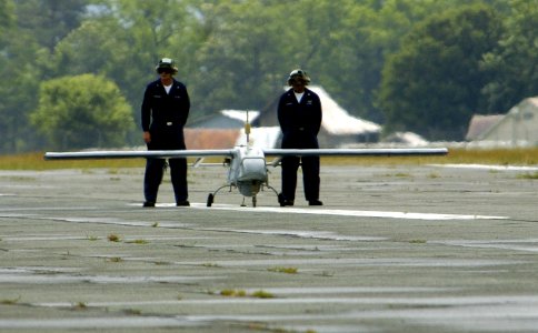 US Navy 050627-N-0295M-175 Two Sailors wait for the signal to release an RQ-2B Pioneer Unmanned Aerial Vehicle prior to its flight demonstration