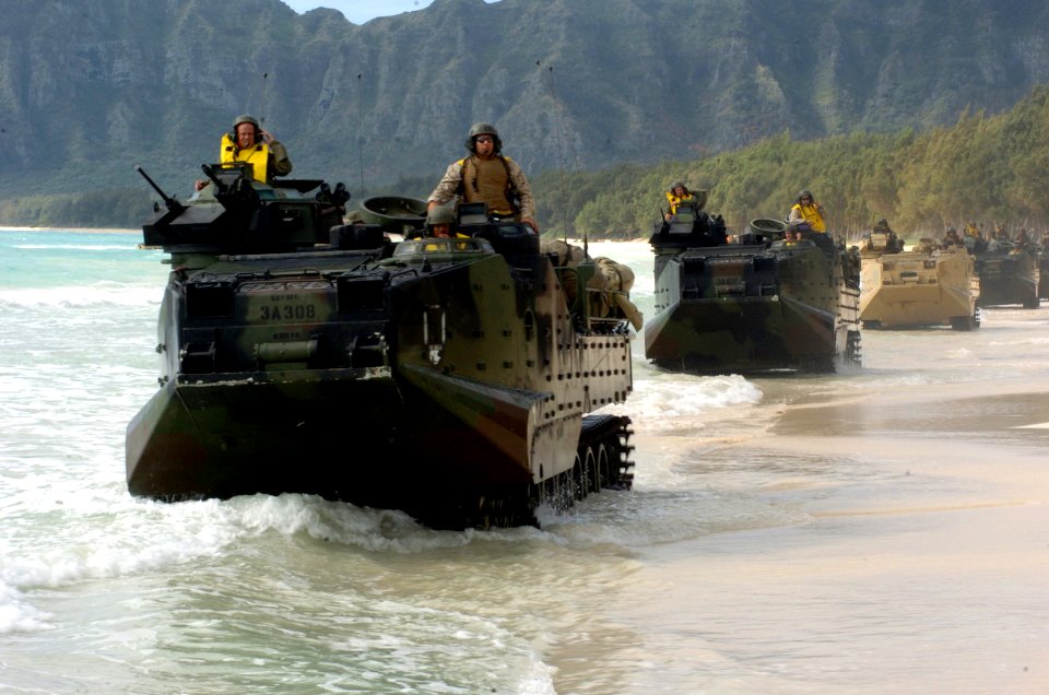 US Navy 050627-N-9866B-018 Amphibious assault vehicles line up on the beach