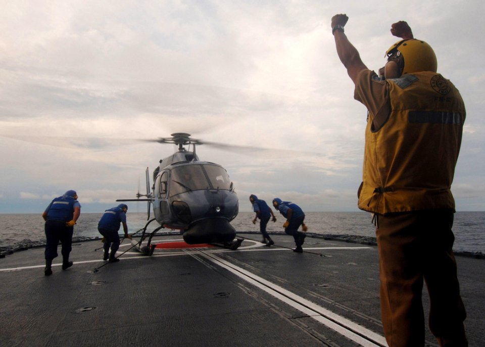 US Navy 050712-N-4374S-034 Sailors assigned to the Colombian frigate ARC Caldas (FM 52) ready an AS 555 helicopter for flight during flight operations in the Pacific Ocean