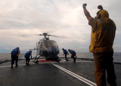 US Navy 050712-N-4374S-034 Sailors assigned to the Colombian frigate ARC Caldas (FM 52) ready an AS 555 helicopter for flight during flight operations in the Pacific Ocean