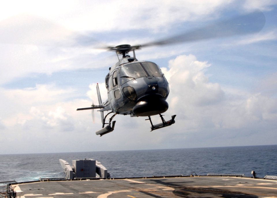 US Navy 050715-N-4374S-010 A Colombian Navy AS-555 Fennec helicopter launches from the flight deck of the guided missile cruiser USS Thomas S. Gates (CG 51) during UNITAS 46-05