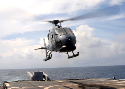 US Navy 050715-N-4374S-010 A Colombian Navy AS-555 Fennec helicopter launches from the flight deck of the guided missile cruiser USS Thomas S. Gates (CG 51) during UNITAS 46-05
