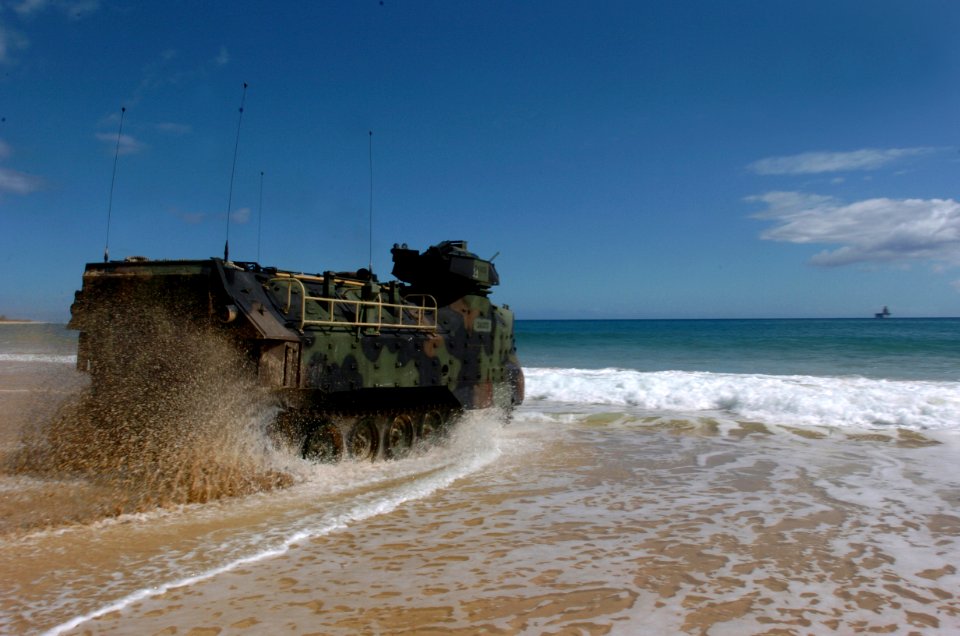 US Navy 050628-N-9866B-039 U.S. Marines assigned to the 3rd Amphibious Assault Battalion drive an amphibious assault vehicle (AAV) ashore on Major’s Bay during amphibious training
