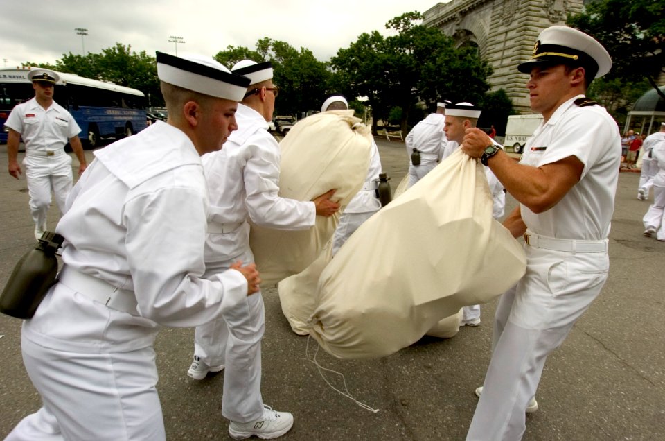 US Navy 050629-N-9693M-299 Prospective Midshipmen retrieve their