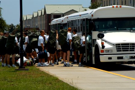 US Navy 050708-N-0000Z-002 Students assigned to Naval Aviation Technical Training Center (NATTC) load onto buses as they prepare to evacuate