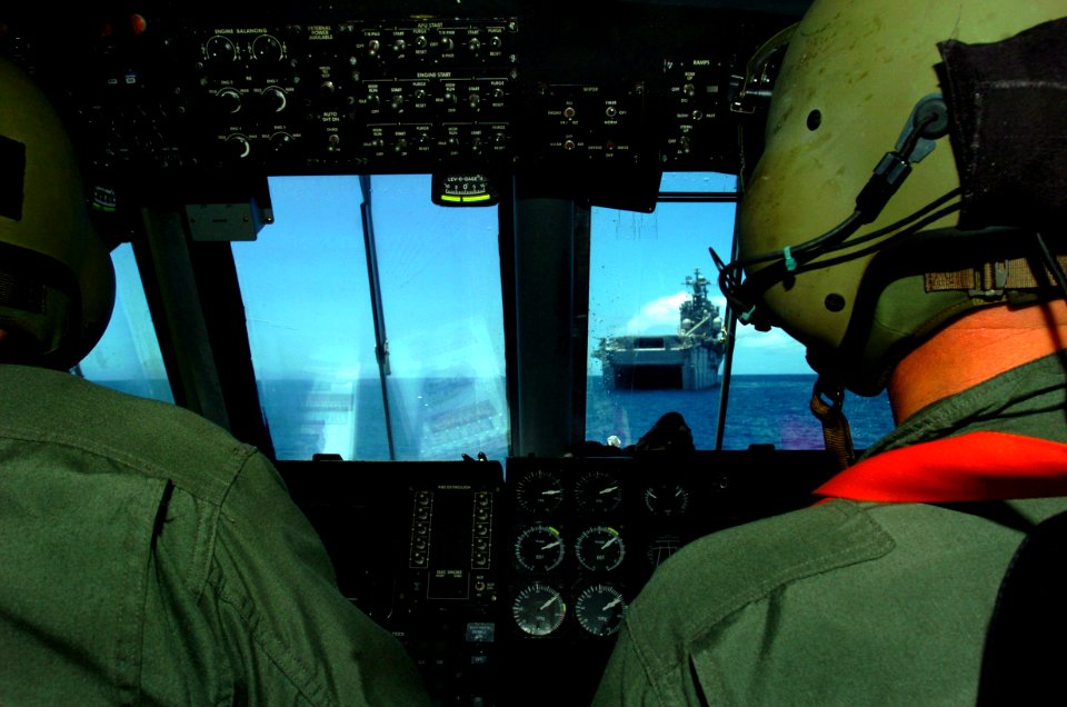 US Navy 050629-N-9866B-093 Craftmaster, Senior Chief Sonar Technician Kevin Chambers and Engineer Gas Turbine System Technician 2nd Class Don Kennlly avigate their Landing Craft, Air Cushion (LCAC)