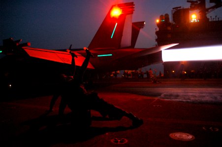 US Navy 050611-N-0000X-001 Squadron troubleshooters give the signal that an F-A-18F Super Hornet is safe for launch from the flight deck aboard the Nimitz-class aircraft carrier USS Carl Vinson (CVN 70)
