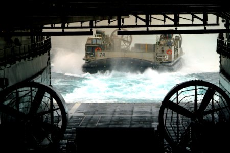 US Navy 050707-N-4772B-024 A Landing Craft, Air Cushion (LCAC), assigned to Assault Craft Unit Five (ACU-5), makes its approach into the well deck aboard the amphibious dock landing ship USS Harpers Ferry (LSD 49)