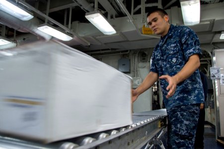 USS Bonhomme Richard (LHD 6) Stores Offload 161123-N-TH560-013
