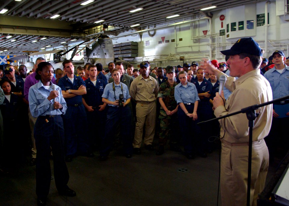 US Navy 050712-N-0962S-199 Master Chief Petty Officer of the Navy (MCPON) Terry Scott answers a Sailor's question aboard the amphibious assault ship USS Kearsarge (LHD 3)