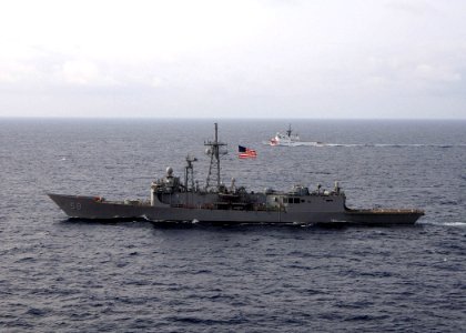 US Navy 050711-N-4374S-002 The guided missile frigate USS Samuel B. Roberts (FFG 58) underway along side the U.S. Coast Guard cutter USCG Forward (WMEC 911) in the Pacific Ocean