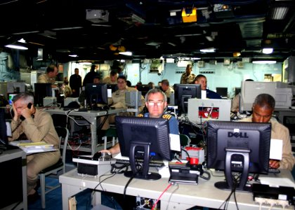 US Navy 050716-N-1804W-004 U.S. and Coalition joint forces man the Joint Operations Center aboard the U.S. Second Fleet flagship USS Iwo Jima (LHD 7)