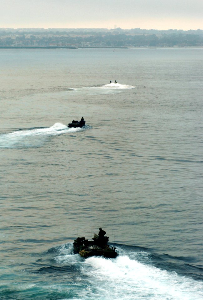 US Navy 050712-N-9866B-013 U.S. Marines assigned to the 3rd Amphibious Assault Battalion, based at Camp Pendleton, Calif., drive their amphibious assault vehicles through the Pacific Ocean