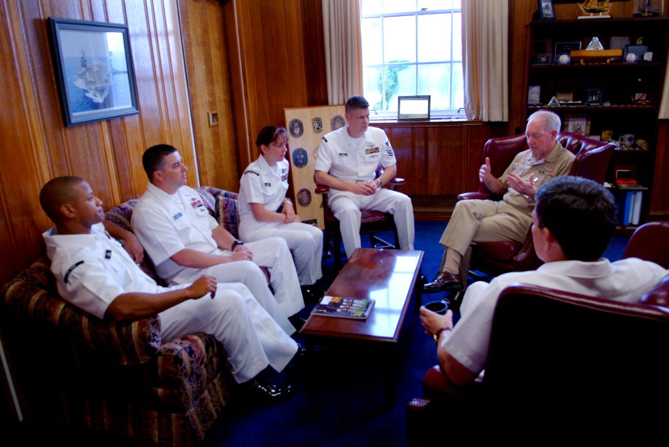 US Navy 050718-N-0962S-010 Chief of Naval Personnel Vice Adm. Gerry Hoewing meets with the 2005 Sailors of the Year and Master Chief Petty Officer of the Navy (MCPON) Terry Scott