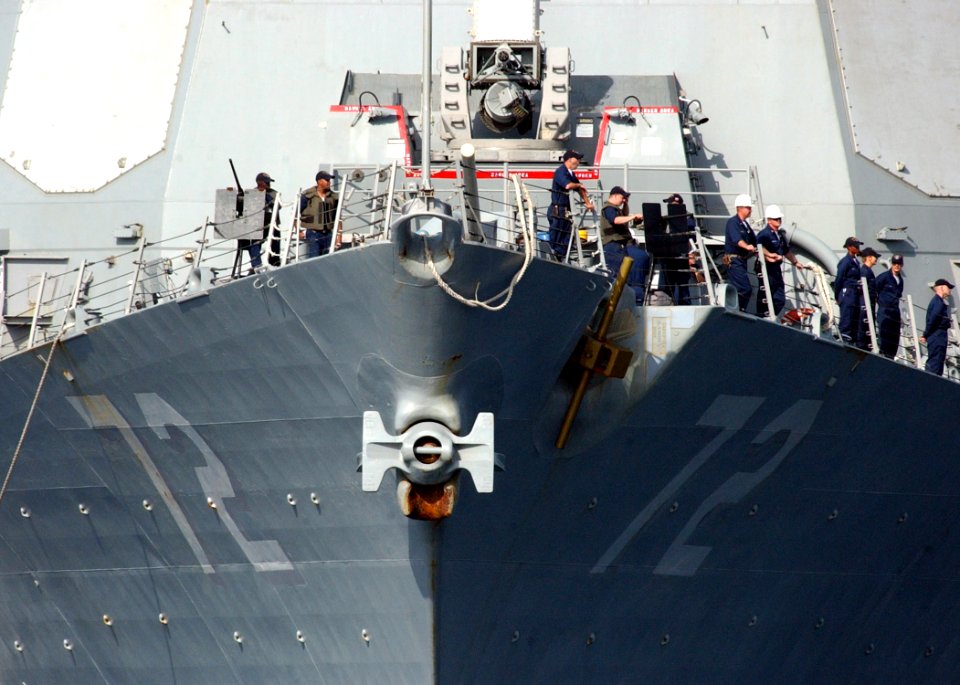 US Navy 050720-N-0780F-005 Sailors watch from the bow of the guided missile destroyer USS Mahan (DDG 72) as they arrive in Souda Bay for a routine port visit
