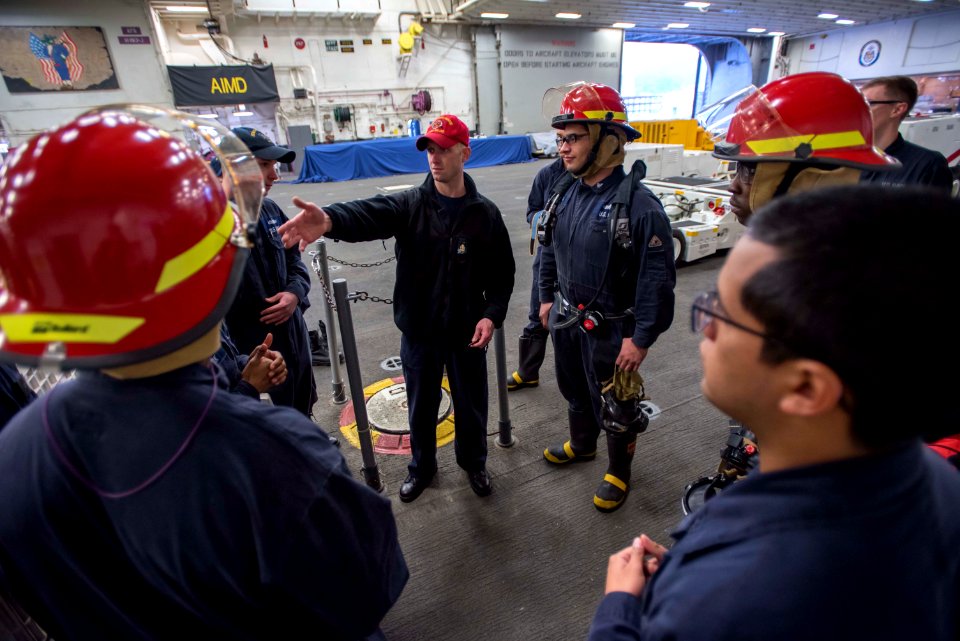 USS Bonhomme Richard (LHD 6) Mail Call 170102-N-TH560-025