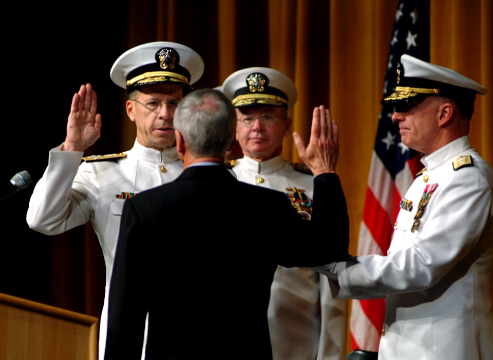 US Navy 050722-N-0962S-002 Secretary of the Navy Gordon England administers the Oath of Office to Adm. Mike Mullen. Adm
