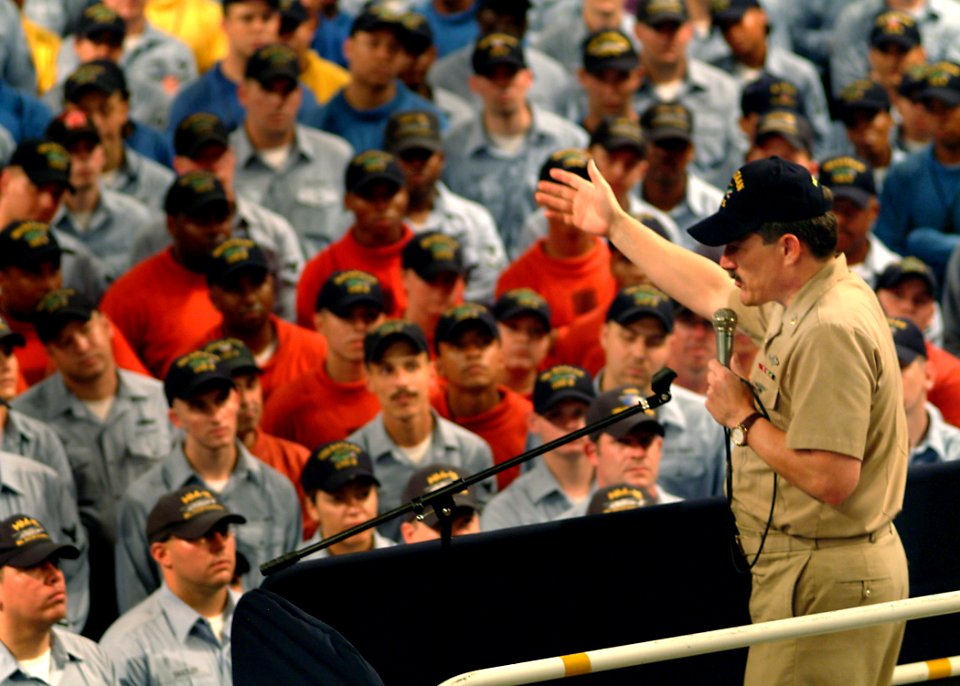 US Navy 050804-N-0962S-140 Master Chief Petty Officer of the Navy (MCPON) Terry Scott speaks to Sailors about the importance of personal readiness at an all hands call in the well deck aboard the amphibious assault ship USS Bat