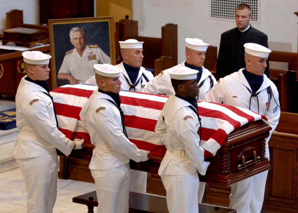 US Navy 050723-N-5390M-002 The casket of Medal of Honor recipient, retired Vice Adm. James B. Stockdale, is carried from the U.S. Naval Academy Chapel by the ceremonial guard