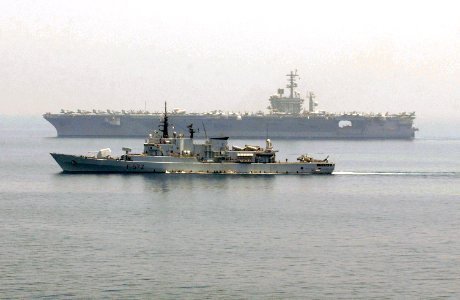 US Navy 050729-N-0413R-069 The Italian frigate, ITS Libeccio (F 572), sails along side the nuclear-powered aircraft carrier USS Nimitz (CVN 68) during routine operations