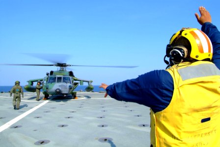 US Navy 050809-N-4772B-027 A Blackhawk helicopter from the Royal Brunei Air Force sits on the deck aboard the amphibious dock landing ship USS Harpers Ferry (LSD 49)