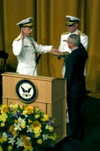 US Navy 050722-N-0295M-002 Secretary of the Navy Gordon England administers the Oath of Office to Adm. Mike Mullen