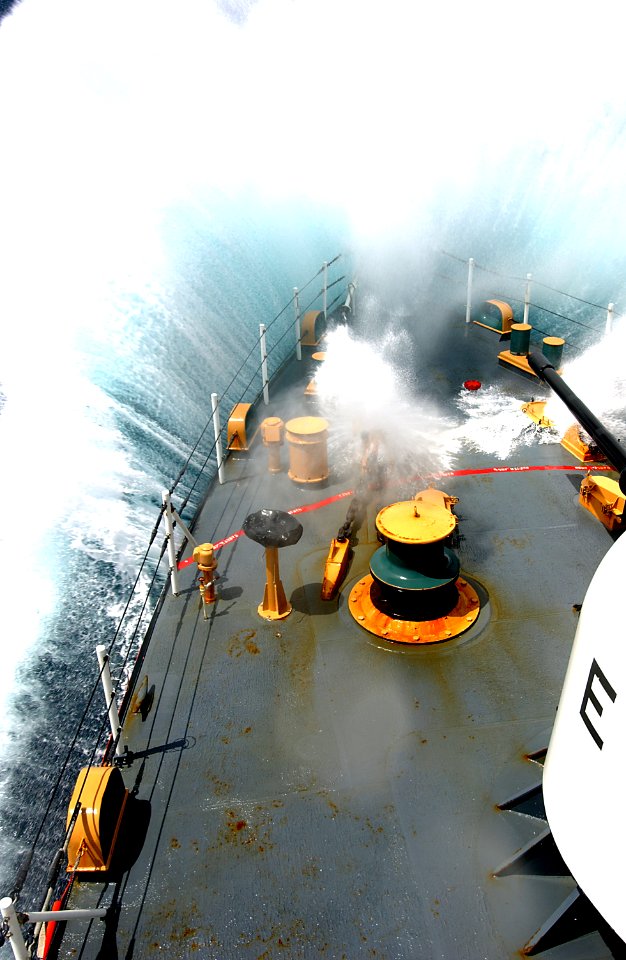 US Navy 050730-C-3292S-531 The U.S. Coast Guard cutter USCGC Bear (WMEC 901) crashes through fourteen-foot waves off the coast of western Africa