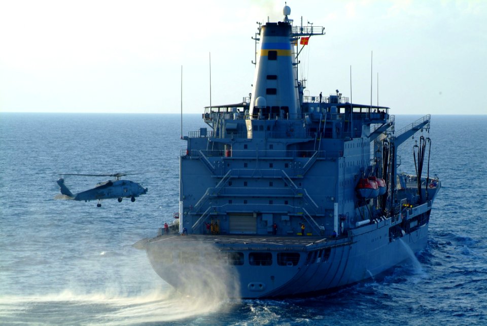 US Navy 050729-N-4772B-061 An SH-60B Seahawk helicopter prepares to land on the flight deck of the Military Sealift Command (MSC) underway replenishment oiler USNS Guadalupe (T-AO 200)