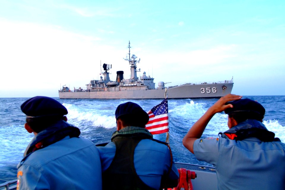 US Navy 050728-N-4772B-428 Indonesian Navy boarding team members ride one of the amphibious dock landing ship USS Harpers Ferry's (LSD 49) small boats from the Indonesian frigate Karel Satsuit Tubun (KST 356) to the guided miss