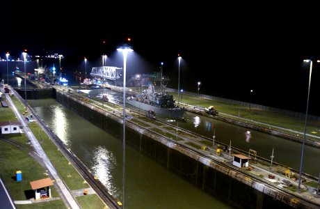US Navy 050807-F-4883S-115 The mine warfare countermeasure ship USS Devastator (MCM 6) makes her way through the Miraflores Locks of the Panama Canal on the Pacific side of Panama during PANAMAX 05 photo