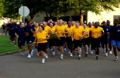 US Navy 050730-N-5862D-206 U.S. Navy chief petty officer (CPO) selectees begin their first formation run as they begin their six-week odyssey aboard Naval Support Activity Mid-South