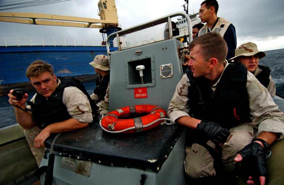 US Navy 050810-F-4883S-056 A Visit Board Search and Seizure team from the U.S. Navy guided missile cruiser USS Thomas S. Gates (CG 51), prepares to board a Panamanian vessel for a simulated medical call during PANAMAX 2005