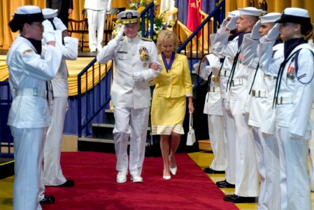 US Navy 050722-N-0295M-019 Retired Adm. Vern Clark and his wife Connie walk through honor side boys at the conclusion of his change of command ceremony and retirement ceremony