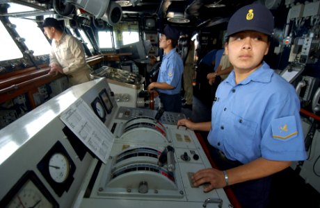 US Navy 050812-F-4883S-082 Lee Helmsman Yessenia Camones Cabellos stands bridge watch aboard the Peruvian frigate BAP Villavicencio (FM 52) in support of PANAMAX 2005