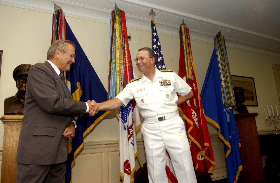 US Navy 050812-F-6911G-004 Secretary of Defense Donald H. Rumsfeld, left, congratulates U.S. Navy Adm. Edmund P. Giambastiani after taking the oath of office as the Vice Chairman of the Joint Chiefs of Staff