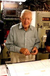 US Navy 050811-N-0653J-006 Former President Jimmy Carter looks over the navigation table in the control room of his namesake ship, the Sea Wolf-class attack submarine USS Jimmy Carter (SSN 23)
